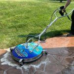 Cleaning and preparing stamped and dyed concrete for application of gloss color enhancing sealer.
